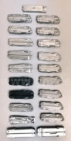 LOT OF 21 ASSORTED LEATHERMAN MULTI-TOOLS