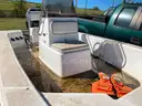 LOT OF A BOAT WITH TRAILER AND MOTOR