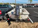 LOT OF A BOAT WITH TRAILER AND MOTOR