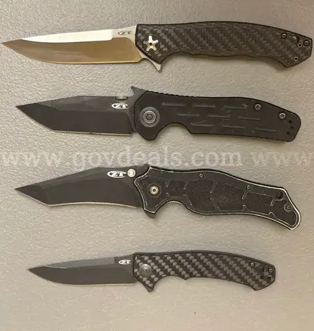 LOT OF 4 ZERO TOLERANCE POCKET KNIVES - USED!