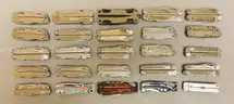 LOT OF 25 ASSORTED STYLE LEATHERMAN MULTI-TOOLS - USED!