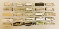 LOT OF 25 ASSORTED STYLE LEATHERMAN MULTI-TOOLS - USED!