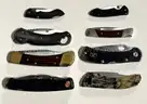 LOT OF 8 BUCK POCKET KNIVES - USED!