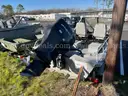 LOT OF A BOAT WITH TRAILER AND MOTOR