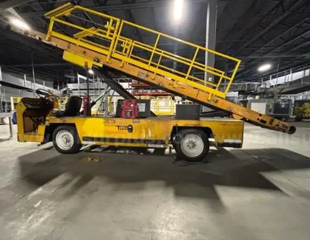 1992 TUG 660-4 BELTLOADER, DRIVEABLE, GAS