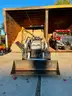 Bobcat Tractor with Bucket Loader, Weight Box, and Micro Mower