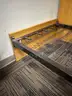 dormitory furniture, including beds, desk, wardrobes, and chairs.