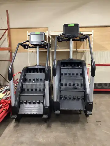 One lot of two stairmasters