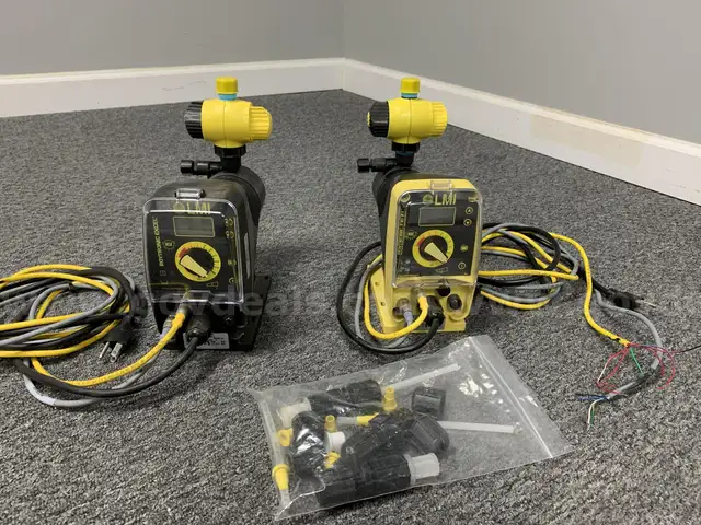 (2) LMI Metering Pumps