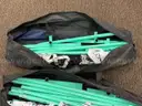 Three (3) portable pickleball nets