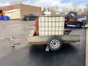 Homemade watering trailer with 300-gallon water tank with 5hp motor