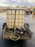 Homemade watering trailer with 300-gallon water tank with 5hp motor