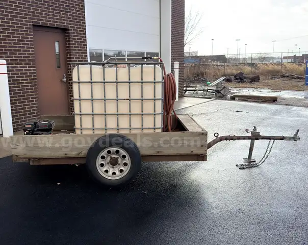 Homemade watering trailer with 300-gallon water tank with 5hp motor