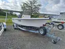 18ft. Parker Open Hull Fiberglass Boat With Yamaha 115HP 4-Stroke And Load Rite Trailer