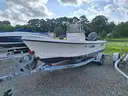 18ft. Parker Open Hull Fiberglass Boat With Yamaha 115HP 4-Stroke And Load Rite Trailer