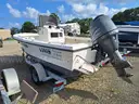 18ft. Parker Open Hull Fiberglass Boat With Yamaha 115HP 4-Stroke And Load Rite Trailer