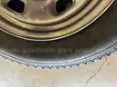 4 - Firestone LT245/70R17 Tires with Rims