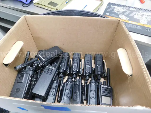 Lot of Motorola Handheld Radios , Microphones , and Charges