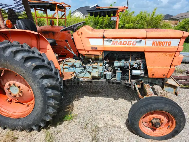 KUBOTA TRACTOR AND BUSH HOG SHREDDER
