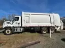 2014 Freightliner with DuraPack 5000 Rear Loading Refuse Body