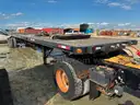 2014 Capacity Yard Dog and 2011 Fontaine 48ft Flatbed Sliding Dual Axel Trailer