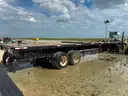 2014 Capacity Yard Dog and 2011 Fontaine 48ft Flatbed Sliding Dual Axel Trailer