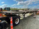2014 Capacity Yard Dog and 2011 Fontaine 48ft Flatbed Sliding Dual Axel Trailer