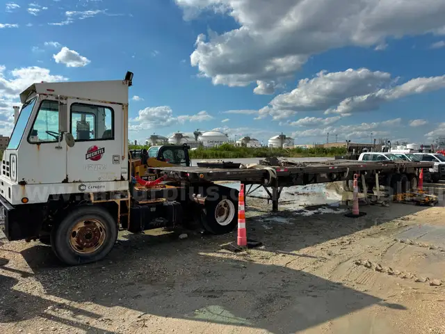 2014 Capacity Yard Dog and 2011 Fontaine 48ft Flatbed Sliding Dual Axel Trailer