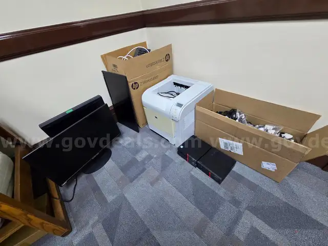 4 Mini Computers, 1 Printer, 3 Monitors, and a Box of Misc.