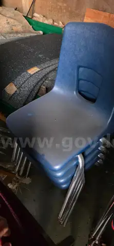27 - Blue plastic classroom chairs