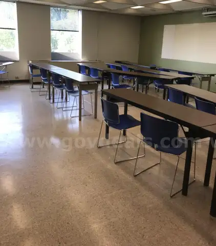 Used classroom chairs and folding classroom tables. (FR304)