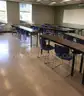 Used classroom chairs and folding classroom tables. (FR304)