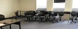 20 used rolling classroom chairs. (FR310)