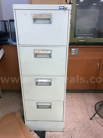 2 used vertical filing cabinets with key. (FR308)