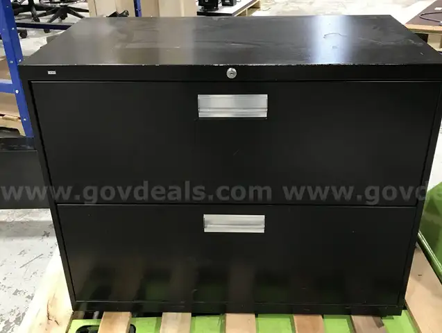 Used 2 drawer lateral filing cabinet and wall mount magazine holder. (OP)