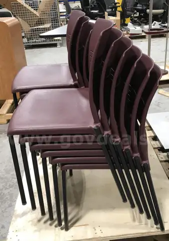 12 used maroon stackable chairs. (OP)