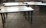 6 used rolling classroom tables. (S2)