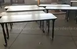 6 used rolling classroom tables. (S2)