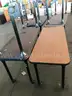 7 used classroom tables. (S2)