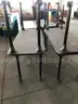 7 used classroom tables. (S2)