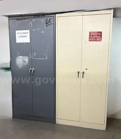 2 used double door metal cabinets. (FM)
