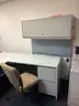 Used L shaped desk with overhead bin. (FM)