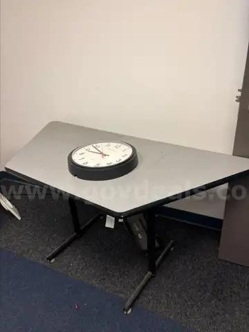 Used Trapezoid table. (FM)