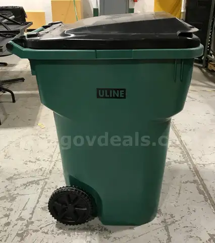 Used 95 gallon rolling trash bin with lid. (OP)