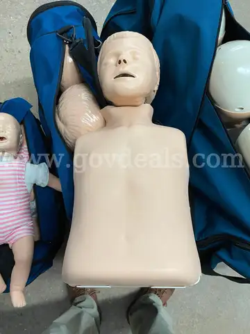 Lot of Twelve (12) CPR Mannequins / Four (4) Infant, Four (4) Child, & Four (4) Adult