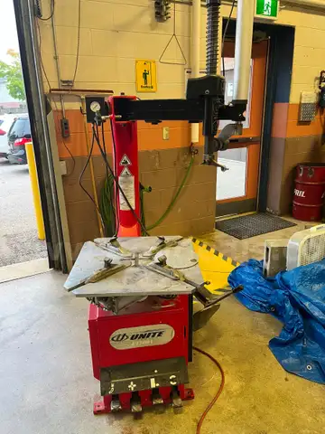 Unite U 2091 Semi-Automatic Swing Arm Tire Changer
