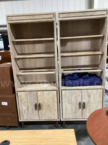 Two (2) Light Colored Bookcases