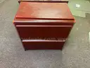 Metal Desk with Assorted Office Accessories and Wooden Cabinet