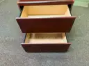 Metal Desk with Assorted Office Accessories and Wooden Cabinet