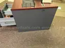 Metal Desk with Assorted Office Accessories and Wooden Cabinet